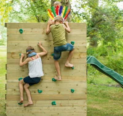 child on an outdoor climbing frame