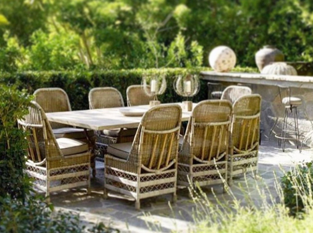 rattan chairs in country garden