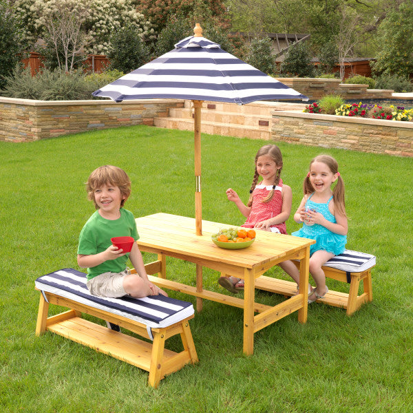 kids picnic table with navy and white cushions for Hamptons styling in your backyard